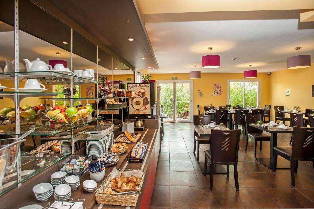 Brit Hotel Confort Villeneuve Sur Lot Bias  Restaurace fotografie